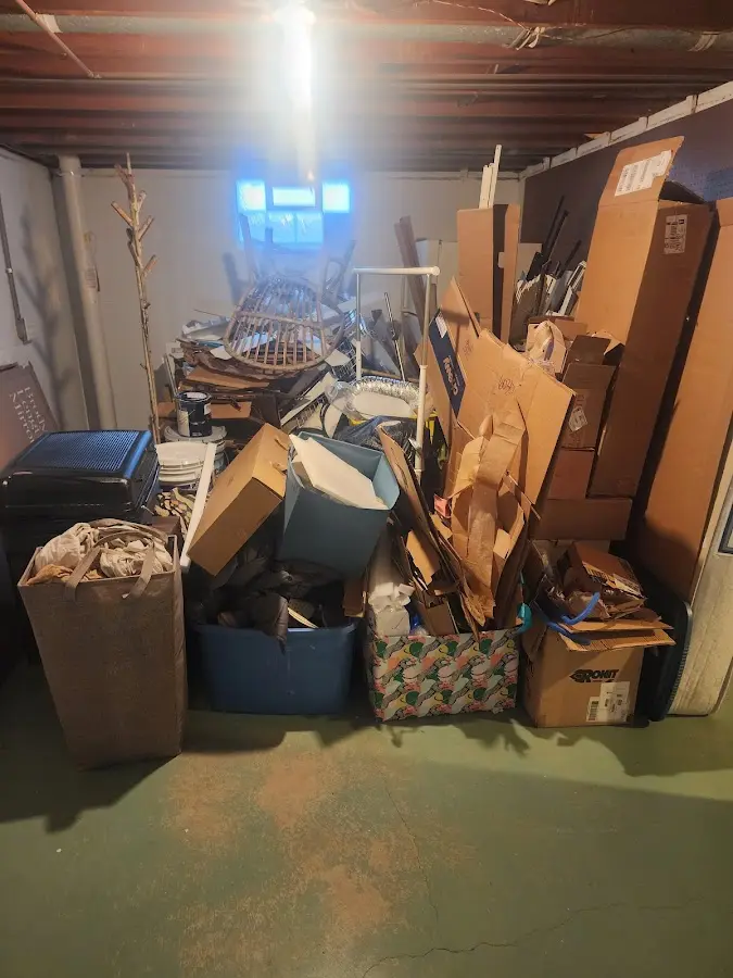 Roll-off dumpster container at job site for 4 Yard Dumpster Rental in Chazy